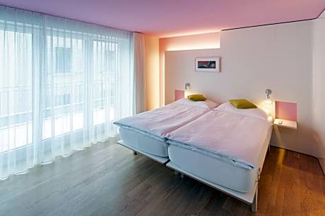 Junior Suite with Balcony/Sitting Area or Family Room