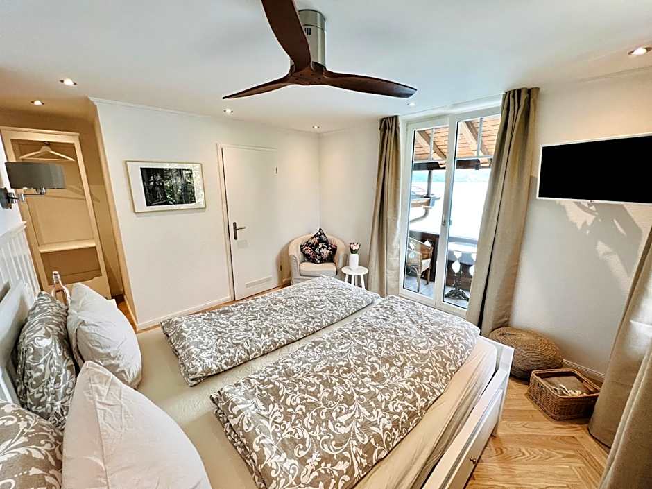Boutique Hotel Niesenblick - direkt am Thunersee gelegen mit SELF CHECK IN & digitaler Rezeption