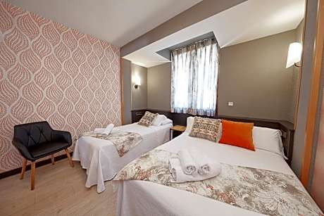 Triple Room (2 Adults + 1 Child)