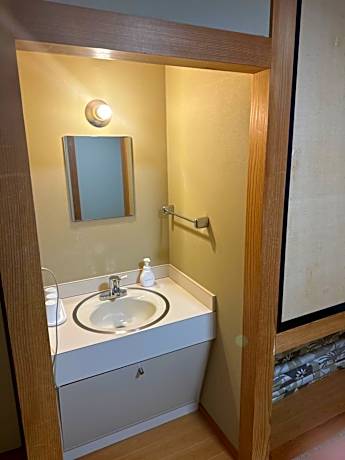 Quadruple Room with Shared Bathroom