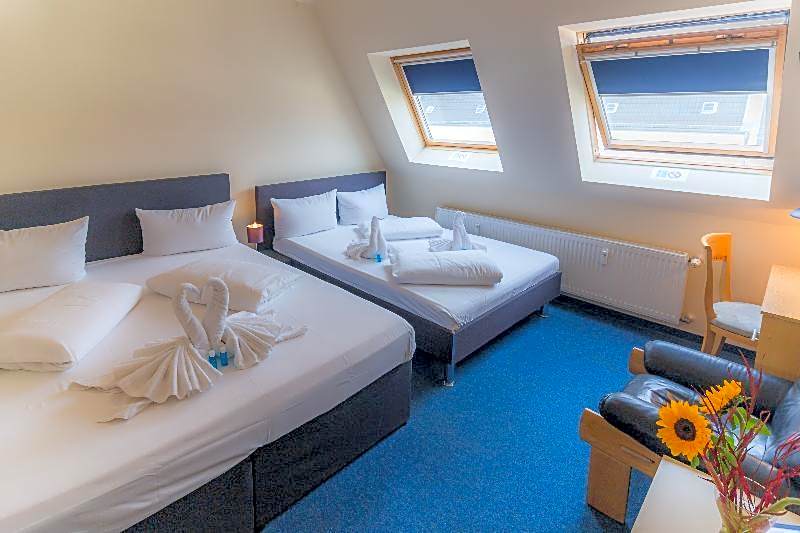 Zdjęcie 1 z 7 — Triple Room