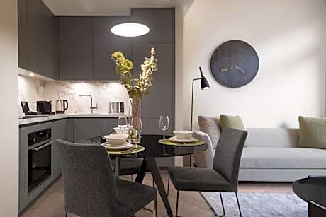 Two-Bedroom Apartment with Balcony and City View