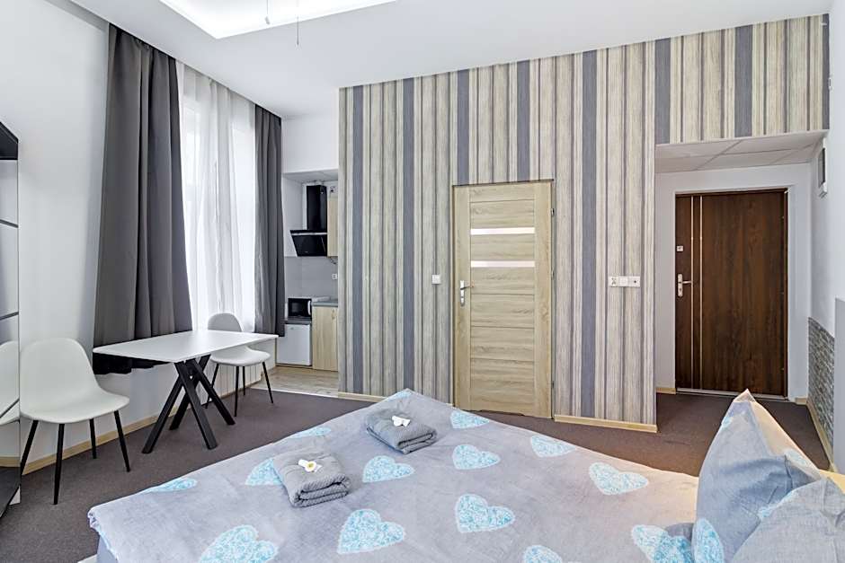 Queen Apartments