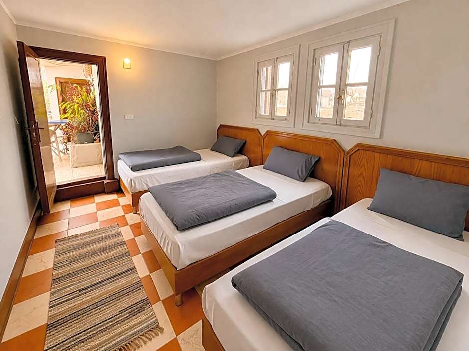 Photo 1 of 5 of Triple Room with Private Bathroom