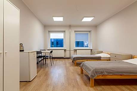 Single Bed in Dormitory Room