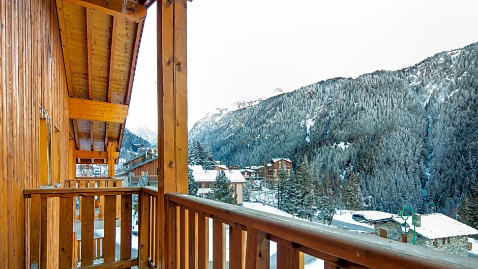 Vacancéole - Résidence Les Chalets de la Ramoure