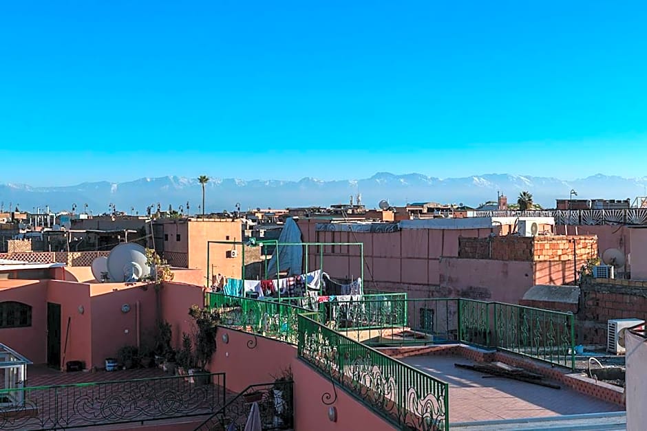 Riad Le J