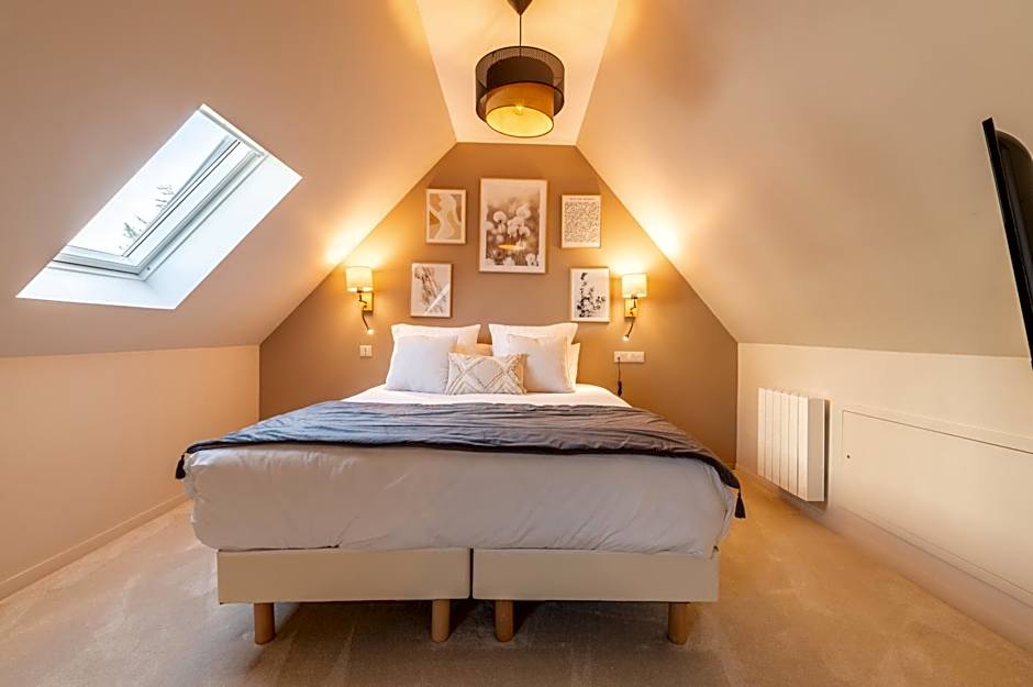 Hôtel Échappée en Baie - Parking privé gratuit dont forfaits bornes électriques réservable