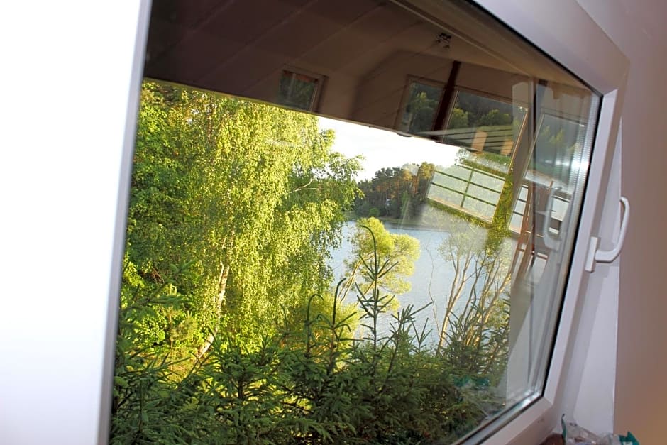 Nadbrzegiem Szczycionek - Domy całoroczne nad jeziorem