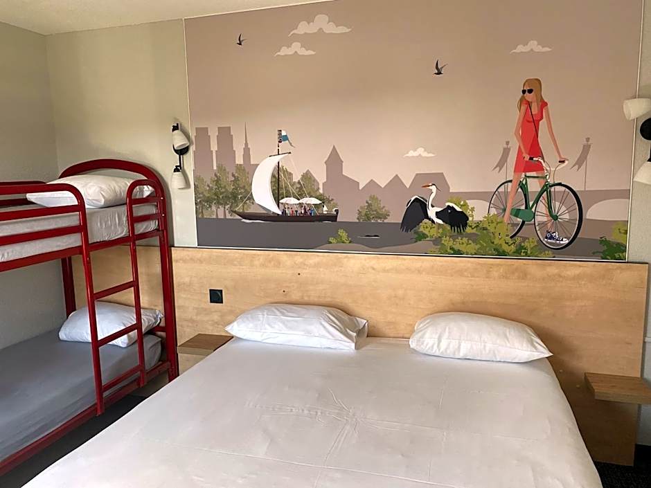 Photo 1 of 5 of Quadruple Room - 1 Queen Bed 2 Bunk Beds