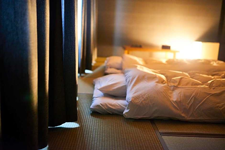 Foto 1 di 3 di Triple Room with Shared Bathroom