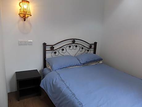 Standard Double Room with Shared Bathroom