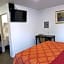 TRAVIS LODGE MOTEL 16