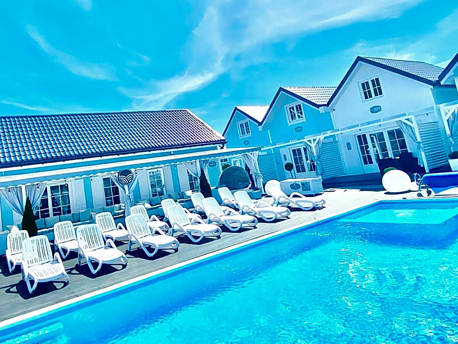 Domki BALTIC FAMILY basen kidsclub rowery