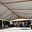 Capital O La Huerta Golf & Hotel