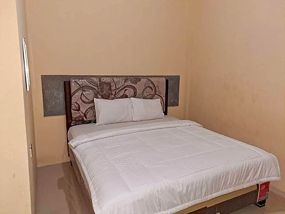 OYO Life 93590 Penginapan Palapa 10 Syariah