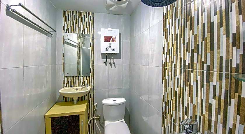 Tini's Guest House Malang Mitra RedDoorz