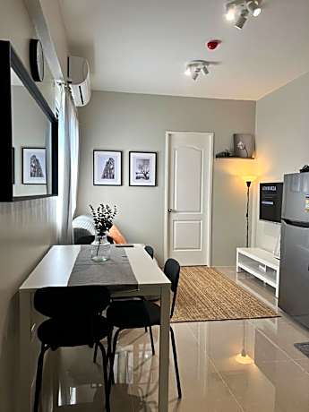 Cozy 1-bed unit near SRP Talisay