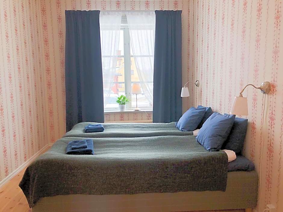 Foto 1 di 8 di Standard Double Room with Shared Bathroom