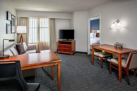 One-Bedroom Queen Suite with 2 Queen Beds, Sofa Bed, Full Kitchen, Living Space
