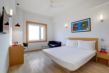 Business Double Room (Happy Hours 1 + 1 IMFL (Select Brands),Complimentary Laundry service for upto 2 clothing item(s) ,Complimentary Welcome Drink on arrival ,Early Check-In upto 2 hours (subject to availability) Late Check-Out upto 2 hours