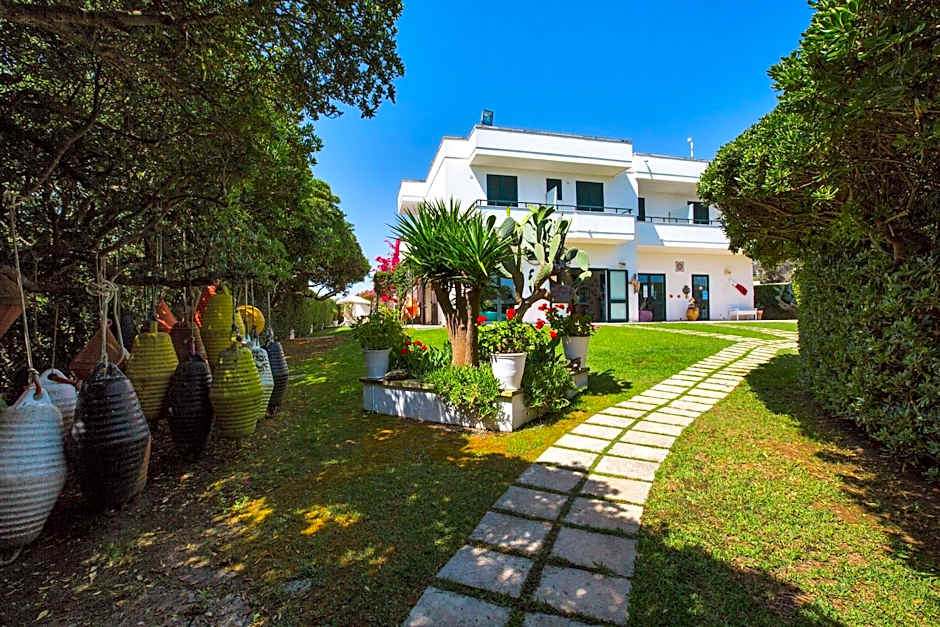 Residence Punta Cassano - In piscina sulla spiaggia di sabbia