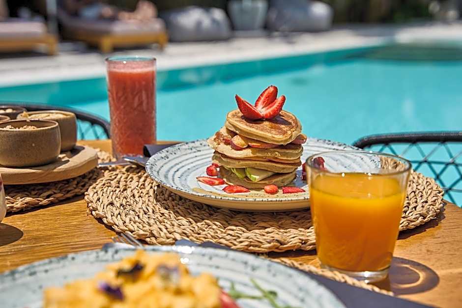 Adorno Beach Hotel and Suites