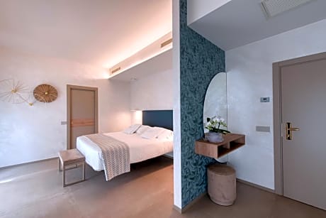 1 Queen 1 Double, Non-Smoking, Junior Suite, Balcony, Sitting Corner, French Size Bed, Chromotherapy Shower