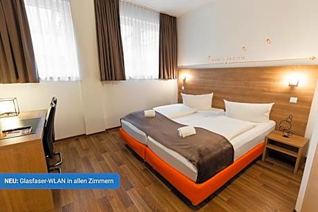 Orange Hotel und Apartments