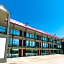 Magnuson Extended Stay and Suites Airport Hotel