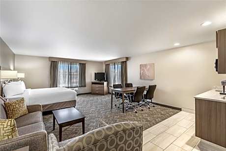 Suite-1 King Bed, Non-Smoking, Sofabed, Sitting Area, Wet Bar, Work Table For 4, Full Breakfast