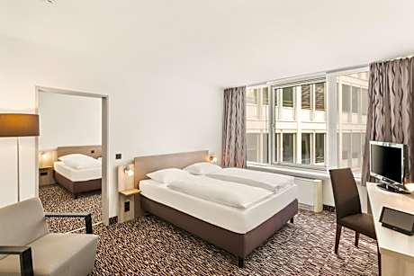 Two-Room Family Room with One Double and Two Single Beds