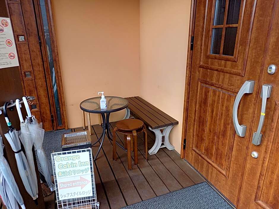 Orange Cabin Inn far from station