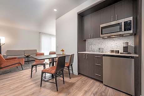 Deluxe Queen Room with Two Queen Beds and Sitting Area