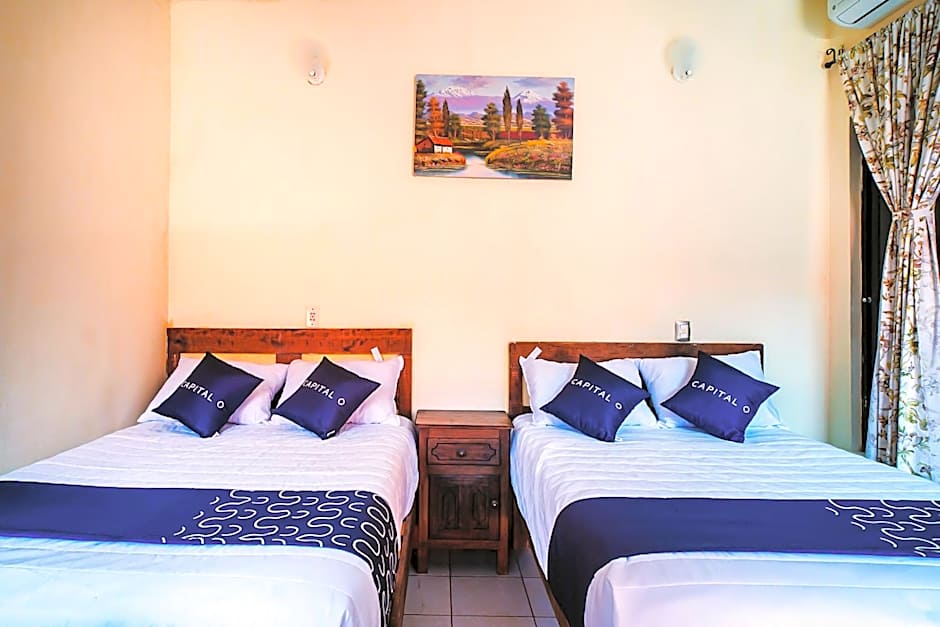 Capital O Hotel Aurora