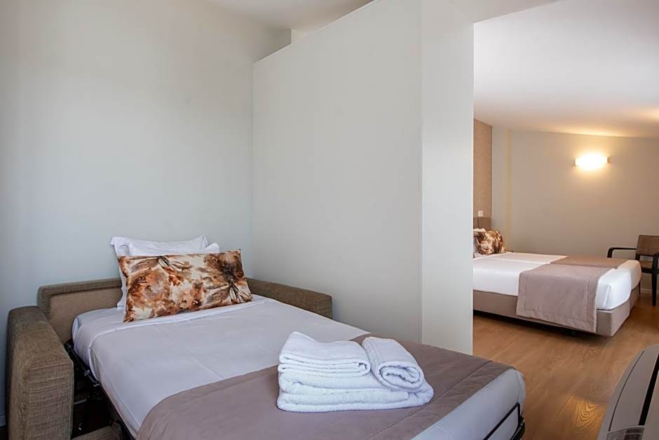 Essence Inn Marianos Hotel