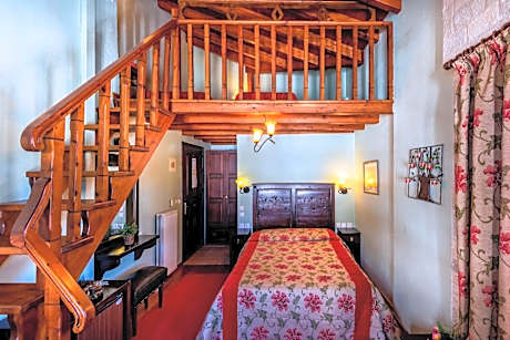 Quadruple Room with Fireplace