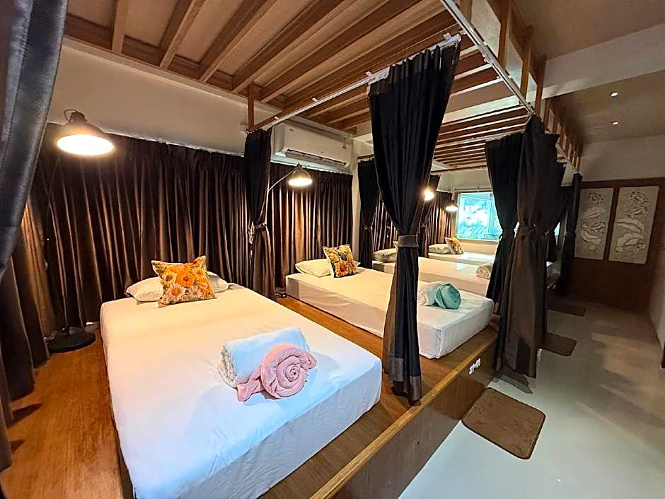 Photo 1 of 9 of Bed in 12 Bed Mixed AC Dormitory Room with Shared Bathroom