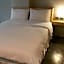 IZEN Budget Hotel & Residences (Plus)