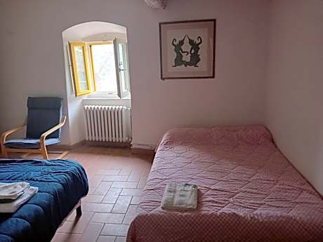 Economy Quadruple Room with Private Bathroom