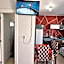 KITNET S2 em TORRES-RS - Na mais bela praia Gaúcha - Cozinha - Banheiro - Ar condicionado - TV smart 32' - Wi-Fi - Estacionamento - Anfitriã Superhost no BnB