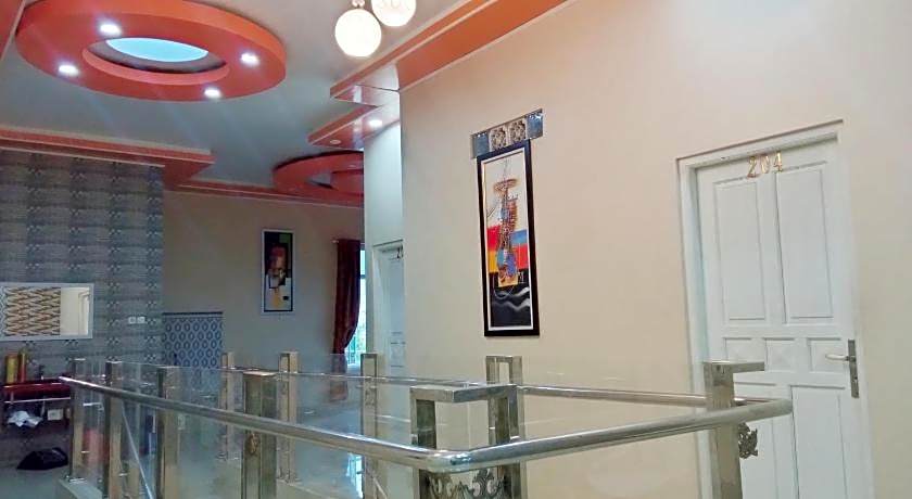 Urbanview Hotel Rifal Home Tegal