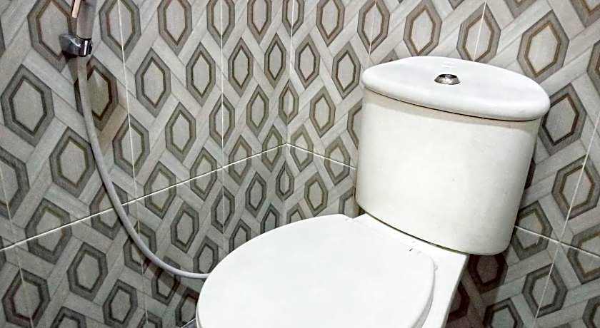 Urbanview Hotel Rifal Home Tegal