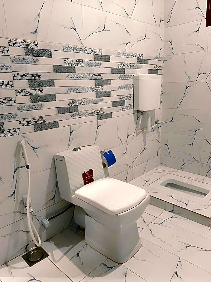Roomi Rezidor – Karachi, TX
