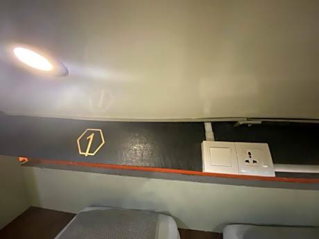 Single Bed in Dormitory Room