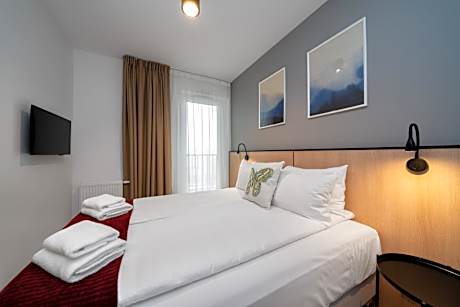 Suite 1 Queen Bed 1 Sofa Bed