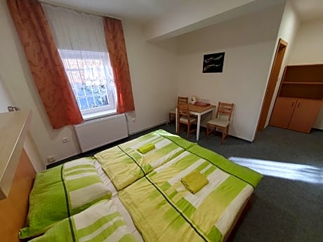 Quadruple Room with Private Bathroom