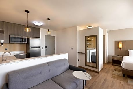 Two-Bedroom Suite with Balcony and Partial Golf View