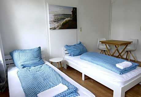 Quadruple Room with Shared Bathroom