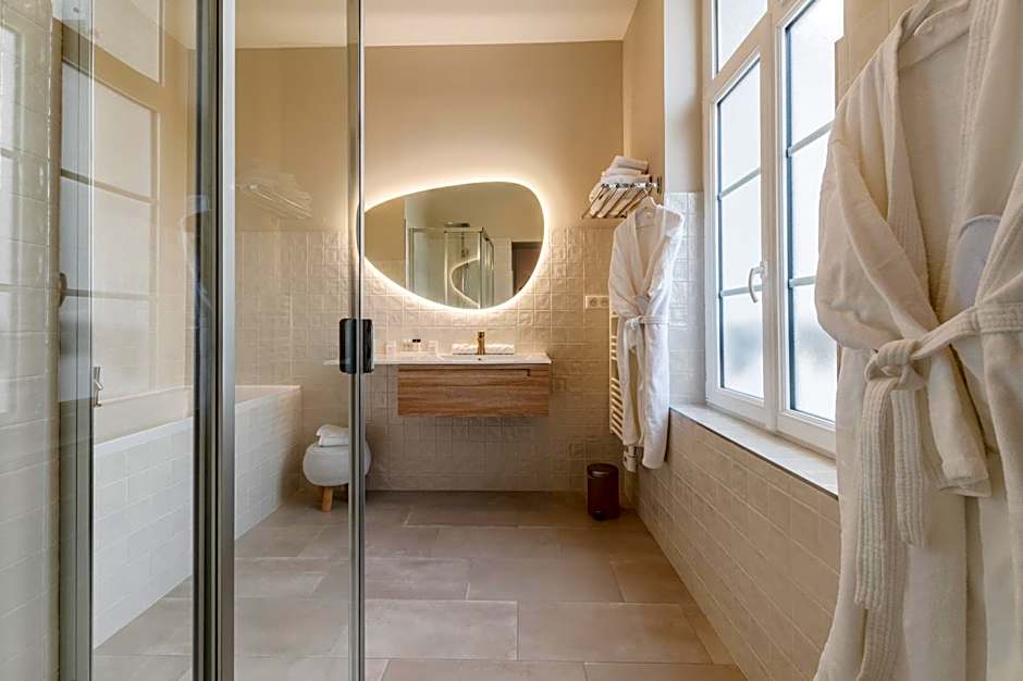 Hôtel Échappée en Baie - Parking privé gratuit dont forfaits bornes électriques réservable